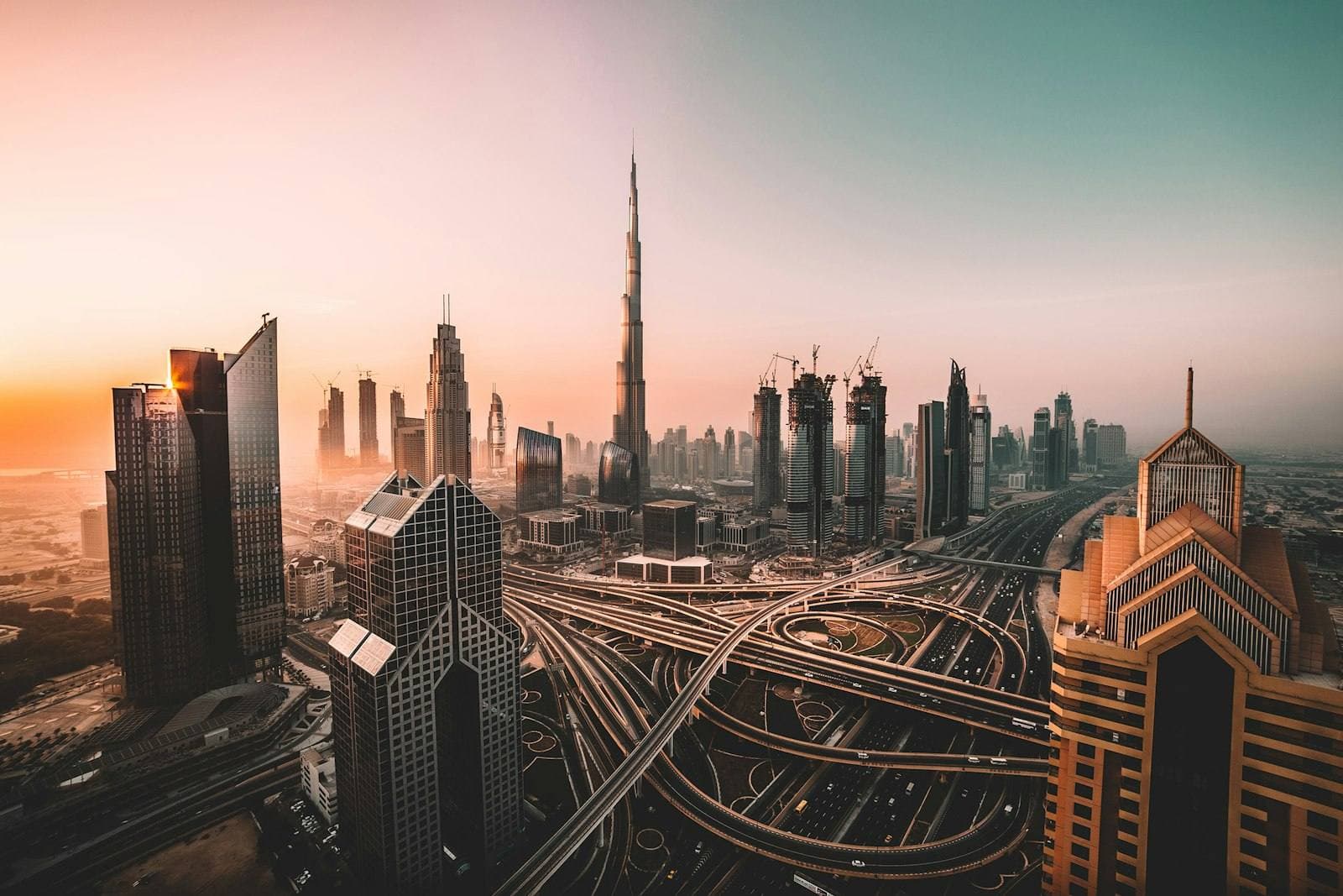 Burj Khalifa and Downtown Dubai skyline at golden hour